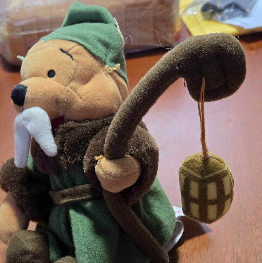 Plush Toy with Green Outfit and Brown Accents Winney The Pooh